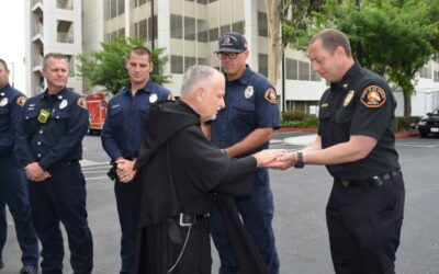 St. Francis Medical Center Blesses Hands of First Responders and Emergency Vehicles for EMS Week